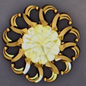 5.12 ct round yellow diamond. GIA graded VVS2.